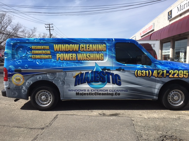 Majestic Window Cleaning & Pressure Washing service van in parking lot