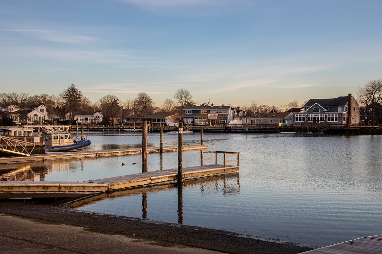 Dock and homes overlooking the waterfront in Massapequa, New York