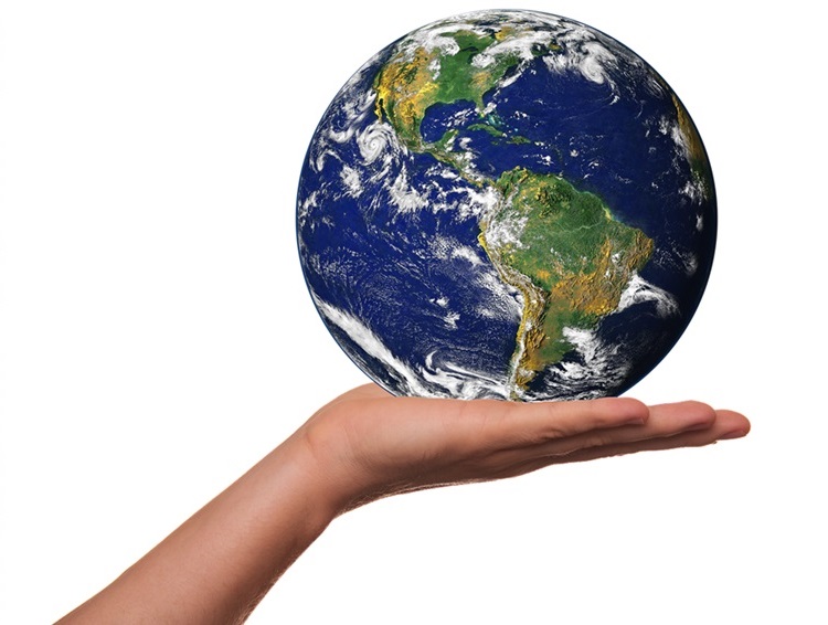 Animated Earth in palm of upturned hand against white background